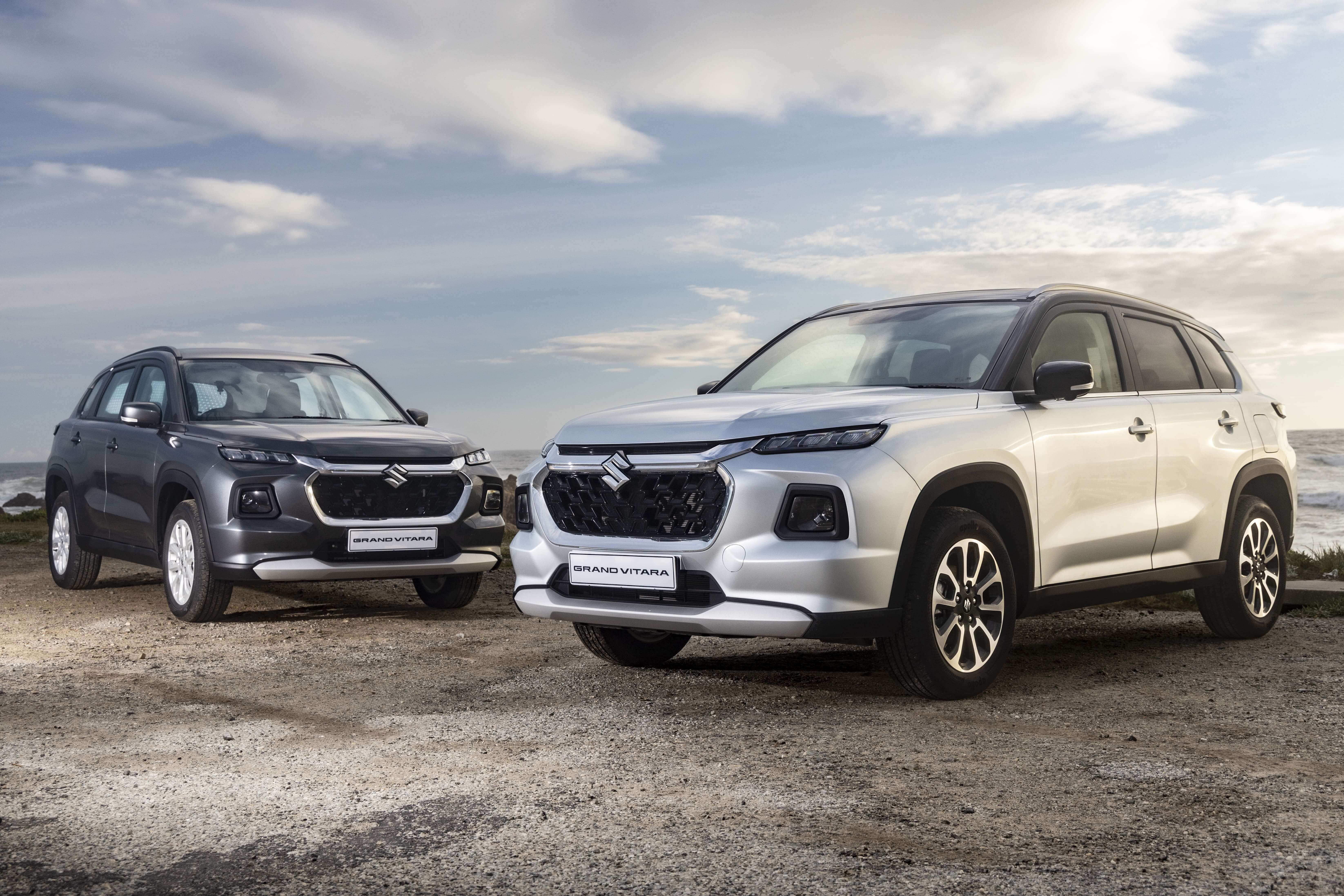 Suzuki Grand Vitara facing each other 