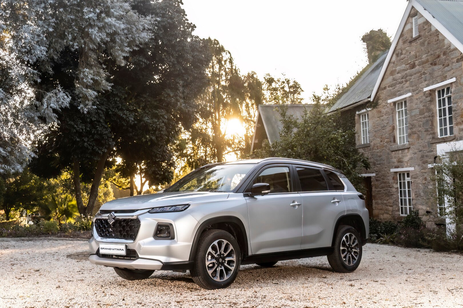 Suzuki Grand Vitara in front of house